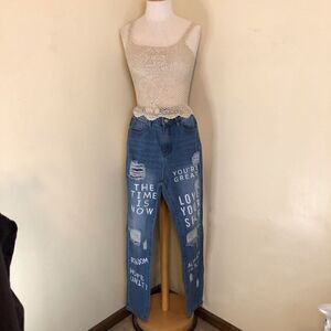 Shein denim jeans with lovely graffiti on the front of the legs.  NWOT